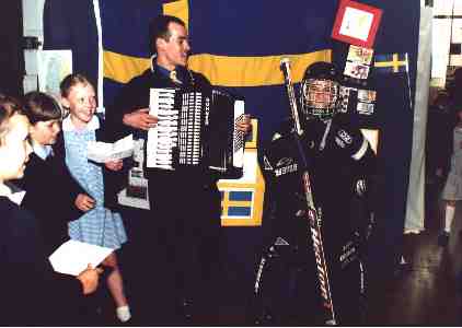 Mr George playing his accordion